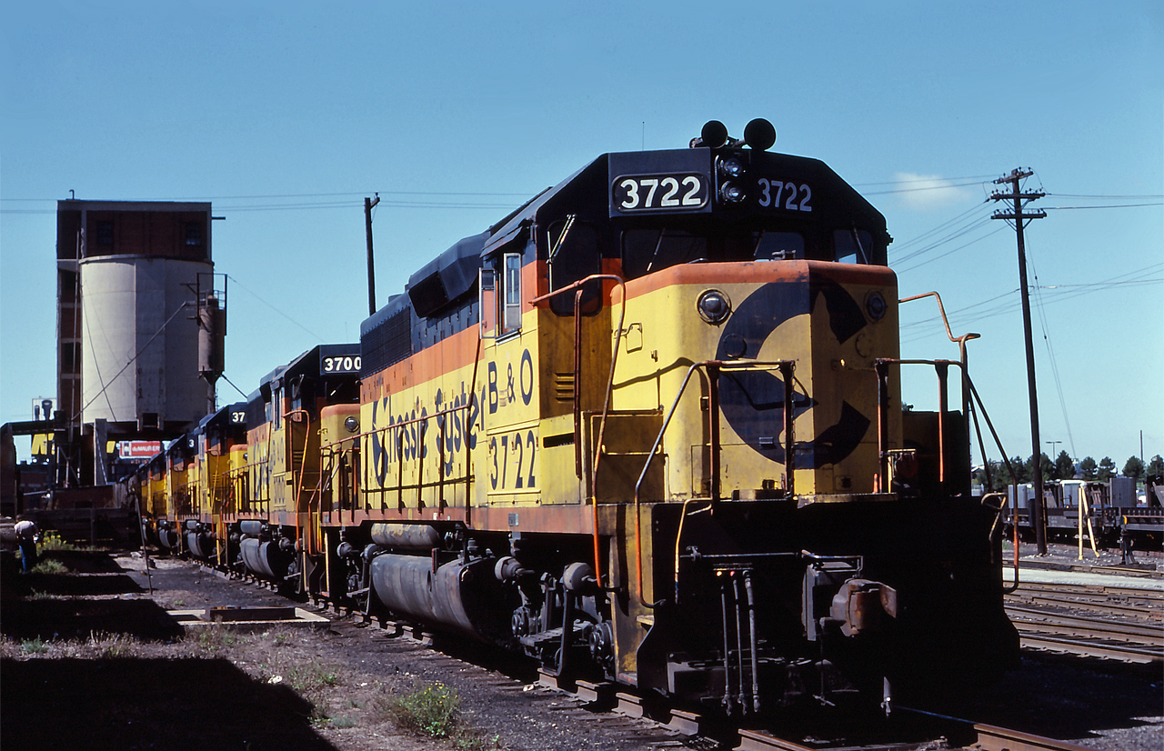 Wearing the colourful Chessie paint scheme, B&O 3722 and 5 other leased B&O units sit outside the John Street Roundhouse in downtown Toronto.  These units were leased by CP and were gathering at John Street to be sent back to their home roads.  The shadows to the left, are those of TH&B geeps being stored at John Street; For more shots of the stored power, see the pictures below. 

B&O, Conrail and TH&B units
 http://www.railpictures.ca/?attachment_id=1563  

TH&B and Penn Central units
 http://www.railpictures.ca/?attachment_id=1564