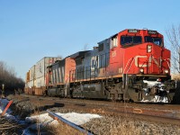 Vancouver to Montreal hotshot 106 is making a mile a minute thru Clarke West with CN 2689 and CN 5520 providing the power.  