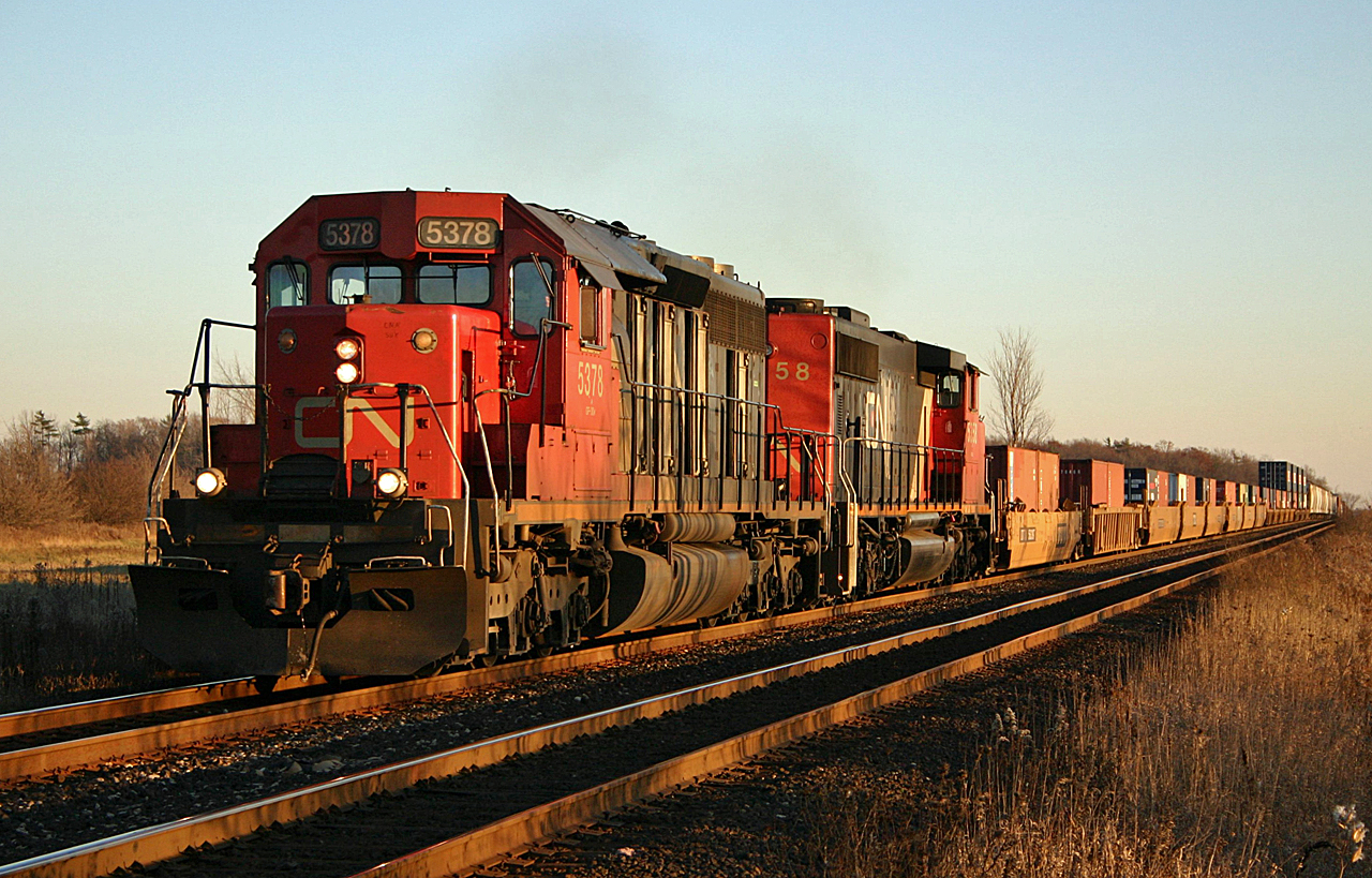 Train 388 led by CN 5378 and CN 5358 works up grade between Tansley and Ash after a meet with 411.