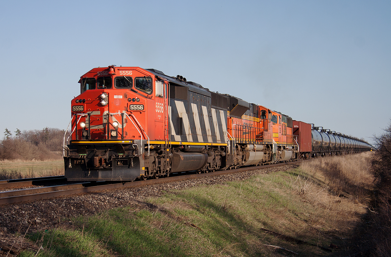 CN 720 works upgrade between Tansley and Ash with CN 5556, BNSF 9316 and BNSF 253 providing the horsepower.