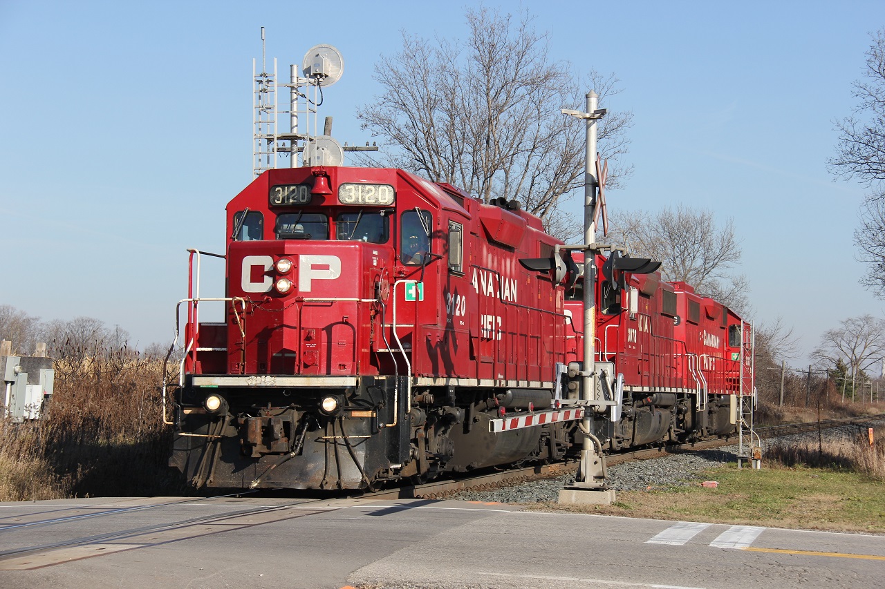 On a pleasant Sunday afternoon in mid-November, the Wolverton Turn comes into Wolverton yard to do its work. I was a tad elated to see a solid set of GP38-2s as opposed to the GP22C-ECO locomotives. Power was CP 3120-CP 3078-CP 3033.