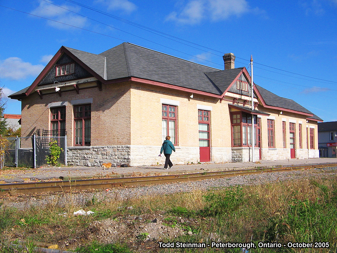 Underneath blue skies, the ex-CP Peterborough station enjoys retirement. Although missing the typical veranda that covered the length of the station to provide passengers shelter, as well as a fairly extensive yard in front of the station - it was otherwise restored nicely in the late 80's / early 90's. Today the line is served by the Kawartha Lakes Railway (KWLR) - which I believe is under CP ownership(?).
