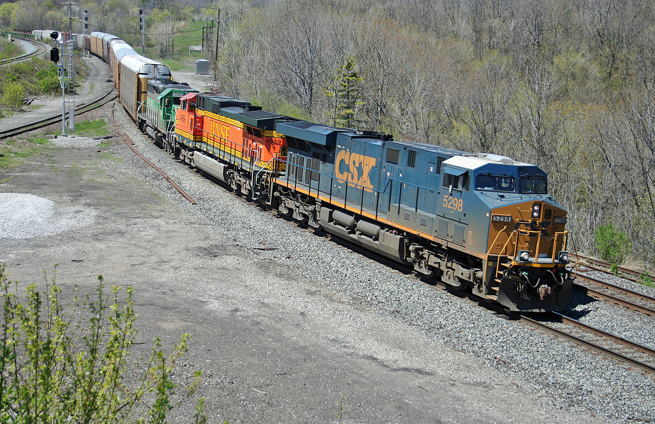 CN 396 rolls through Bayview behind CSXT 5298, BNSF 4959 and GCFX 3069