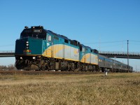 VIA 693 has just departed Portage La Prairie and is stopped just west of the station waiting for clearance at Kearns. The train will diverge onto CN's Gladstone Sub from CN's Rivers Sub at Kearns and will continue north towards its final destination of Churchill, MB.