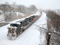 <b>CN 149 in a snowstorm.</b> BCOL 4651 & CN 2449 head west with CN 149 after doing a lift at Turcot West during a snowstorm in February 2014.