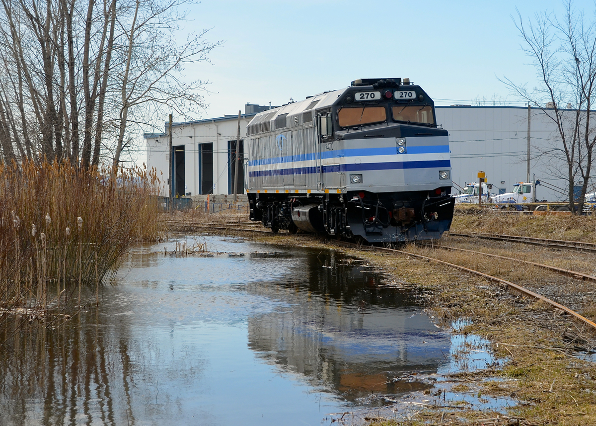 Switching isolated trackage with an F40? Yep, that's what the MMA did. SLC 270 (ex-AMT F40, before that NJT and originally Amtrak) was being used by the Montreal, Maine & Atlantic as a switcher on an isolated stretch of track that did not connect to MMA's network in the spring of 2014. Here it is parked on a rough piece of track near CN's Drummondville Sub.