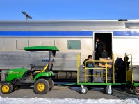 <b>Loading the baggage car.</b> Most VIA trains on the Windsor-Quebec City corridor do not feature checked baggage, but select trains do. Here baggage is loaded one of these trains (VIA 63) at Dorval.