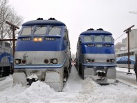 <b>A pair of F59PHI's in the snow.</b> A pair of AMT F59PHI's (AMT 1323 & AMT 1328) are spotted in the snow at Lucien L'Allier Station in Montreal, both leading Candiac-line trains.