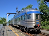 <b>Park car at the rear.</b> The Park Car (Evangeline Park )is at the tail end of an all-Renaissance consist as VIA 15 leaves St-Lambert station. The train will be in Montreal's Central station in about a dozen minutes. 