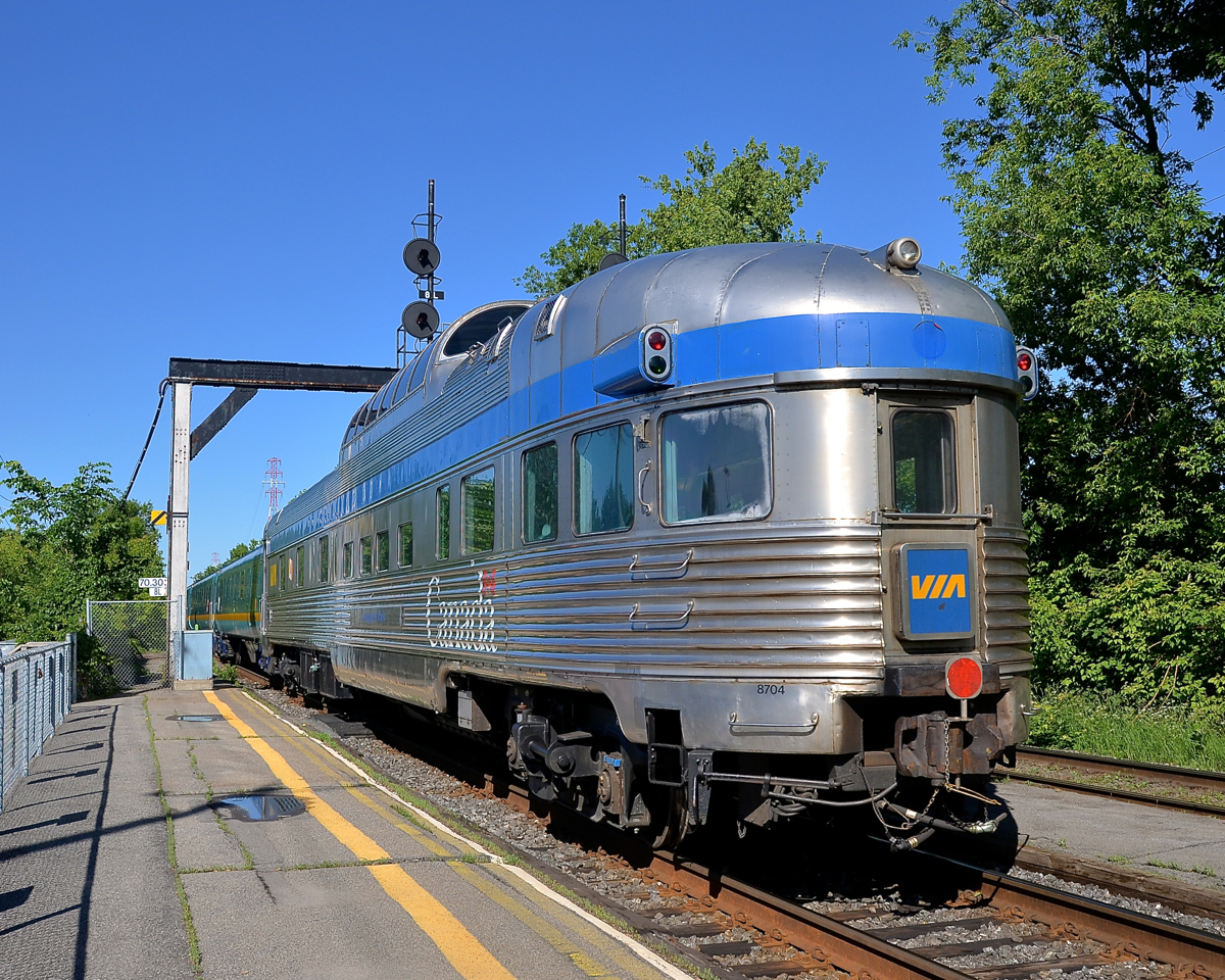 Park car at the rear. The Park Car (Evangeline Park )is at the tail end of an all-Renaissance consist as VIA 15 leaves St-Lambert station. The train will be in Montreal's Central station in about a dozen minutes.