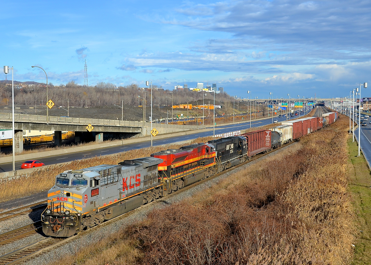 A KCS present for Christmas eve? KCS power is very rare in Montreal, and on Christmas eve I was lucky enough to shoot two leading a train, for the first time. Here CN 529 with two KCS engines up front (KCS 4610 & KCS 4147, with NS 6923 last) is approaching Turcot West. CN 529 originates on Norfolk Southern tracks as NS 31T and becomes CP 931 when interchanged to CP. CN picks it up at Rouses Point where it becomes CN 529.