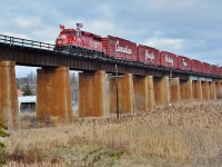 he CPR  Christmas Train 2015 version ( a k a the Canadian Pacific Holiday Train ) CP #2323 West  rolls across the Ganaraska Viaduct built circa 1912.  Business car Van Horne handling the FRED.
 <br>
<br>
 CP#2323 West reportedly encountered three eastbounds at Brighton, Colbourne and Spicer: An ethanol, tank (lead by UP) #142 and double-stack #112 hence #2323 west operating appropriately thirty minutes late with a scheduled 15:00  Bowmanville arrival and the thirty minute stage performance scheduled at 15:15
 <br>
<br>
The CPR Holiday Train U.S.  Version passed through Port Hope earlier in the day, about 09:15, enroute to Hamilton.
 <br>
<br>
14:58 November 30, 2015 image at Port Hope by S.Danko