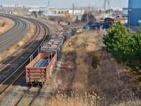 CN 7046 – CN 4116   pushing 11 loads from  Gerdau Ameristeel.
<br>
<br>
Mile 304 Kingston Subdivision, Hopkins Street overpass, Whitby, Ontario, December 9, 2015 image by S.Danko.
<br>
<br>
More Geep:
 <br>
<br>
        <a href="http://www.railpictures.ca/?attachment_id=22043"> at Leaside </a> 
 <br>
<br>
sdfourty
