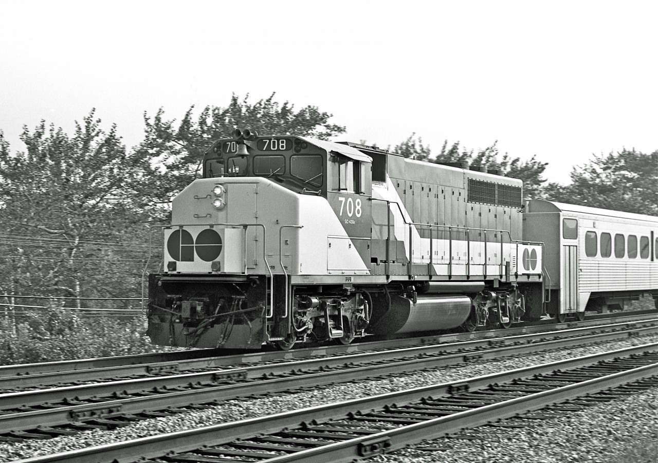 GP40-2W, #708, is shown in the vicinity of Scarborough Golf Club Road, circa 1978.  Manufactured by GMDD in 1975, the locomotive would be sold to CN in 1991, and renumbered as 9675.
