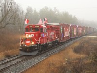 CP 2246 leads this years holiday train, in what can only be described as crappy weather with fog and rain,  past SR 20 on the Galt sub on its way to the Cambridge show at 5pm