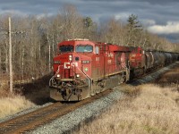 With rain all around, mother nature was kind to me this time. The clouds parted just as CP 8812 with CP 9759 worked their way up the grade at MM43 on the Galt sub. 