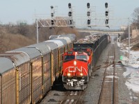 Don't forget to take the garbage out.  For awhile in 2007, CN 385 was hauling large cuts of Toronto garbage to Michigan - someone may know specifically where...here 2 CN's and a UP (this was the FPON enriched 2005-2007 era on CN) head past Snake interlocking...the new track 3 had yet to be placed into service yet...about a month later the first trains were sent over it.