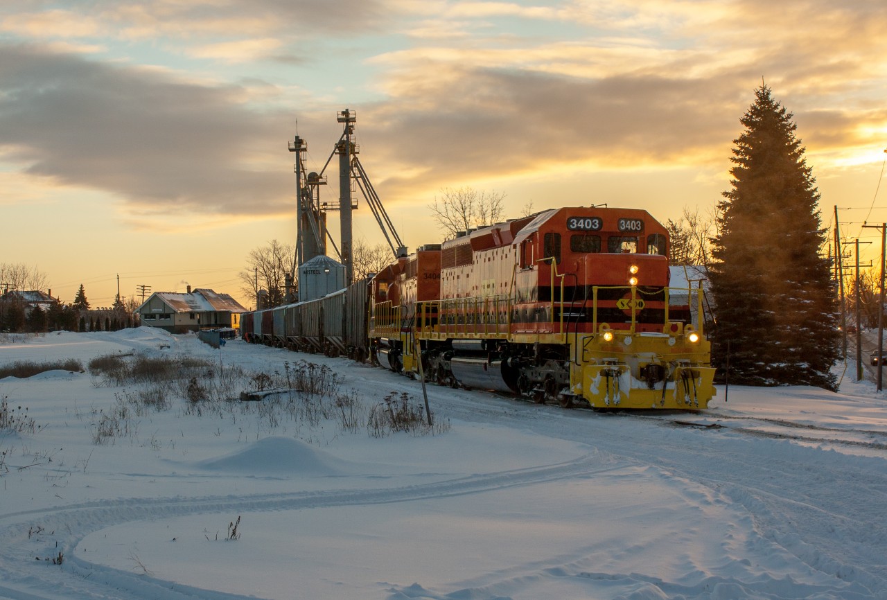RLHH 3403 and RLHH 3404 back a cut of cars into the Purina Kitty Litter Plant in Caledonia early on a February morning.  I was heading in to school when I saw the gates flashing down at Mines Road, a quick check found 597's train tied down outside of town suggesting that they were working one of the local industries.  I headed back into town and found them easily, well worth being late for an 8:30 lecture in my books!