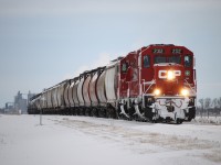 CP 2312 carries the Altona local out of Altona on a snowy Saturday morning.