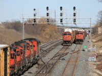 Line'em up: The new track 3 was just recently opened at Snake and offered some interesting photo opps: Here an unknown EB with SD50/2 CN-IC SD40's/3 GP9's passing the usual afternoon Aldershot working trains: 333 autos from Oakville for Buffalo, and 431 from Oakville for South Buffalo, both stopped to work Aldershot at the same time.