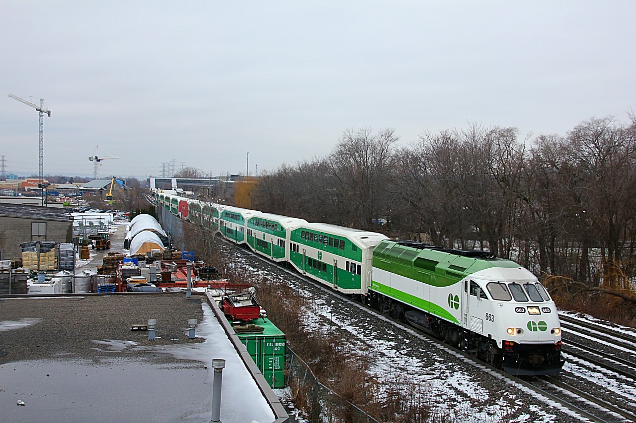 GO engine 663 leads an eastbound train under the Drury Road walkbridge in Burlington, after departing from Burlington GO. This was my first shot with my new Canon Rebel T2i with an 18-200 mm lens.