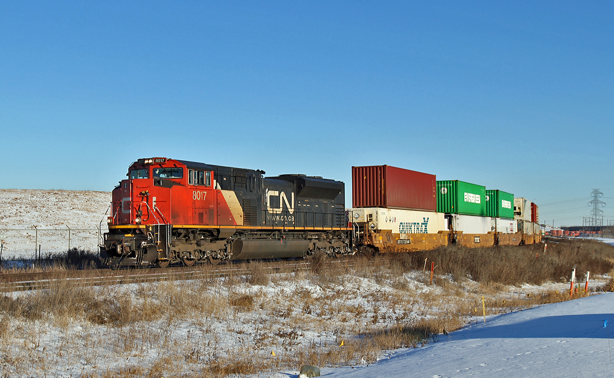 SD70M-2 CN 8017 heads intermodal train 101 west at Clover Bar, approaching Edmonton.