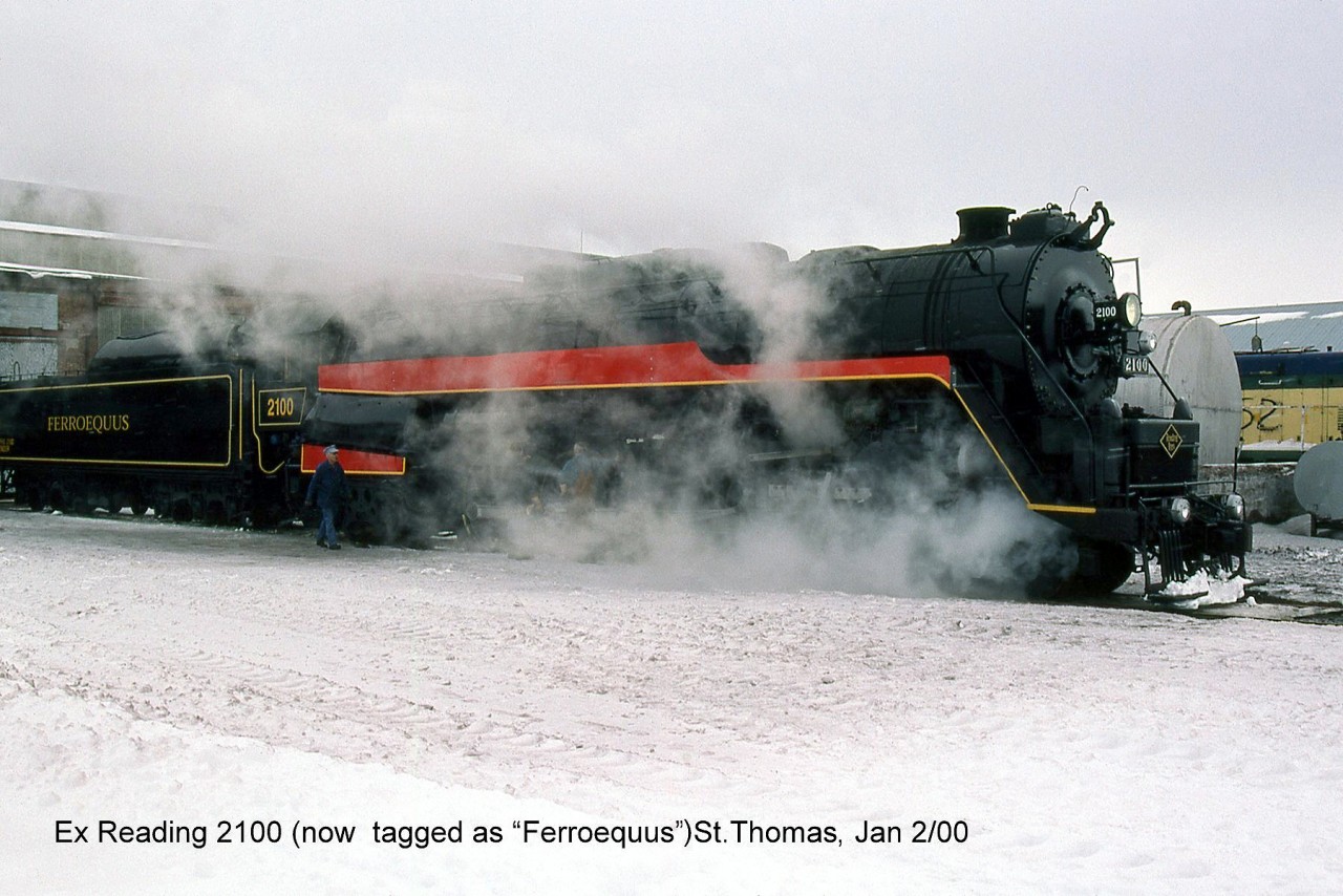 Steam and Snow: A January day in Winter finds privately-owned Reading 4-8-4 2100 outside the Elgin Country Railway Museum's St. Thomas shops, lettered as "Ferroequus 2100". It was in steam that day (hiding two crewmembers by the drivers) and took a run, west down the yard and shortly returned missing its bell. It was found a little later and brought back (I think at this time they still thought they could run fan trips but these never occured during the engine's time in St. Thomas).