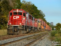 Foreign power? Who cares! A pair of decent locomotives, at least by this photographers opinion charges toward Buffalo on intermodal train 143-10 with some foreign yellow thing in third, that I could have cared less was even there.
<br><br>
Where do you stand on the fence? Are you a foreign fan or do you prefer a classic scene with what nature intended on a given railroad? Comment below. :)