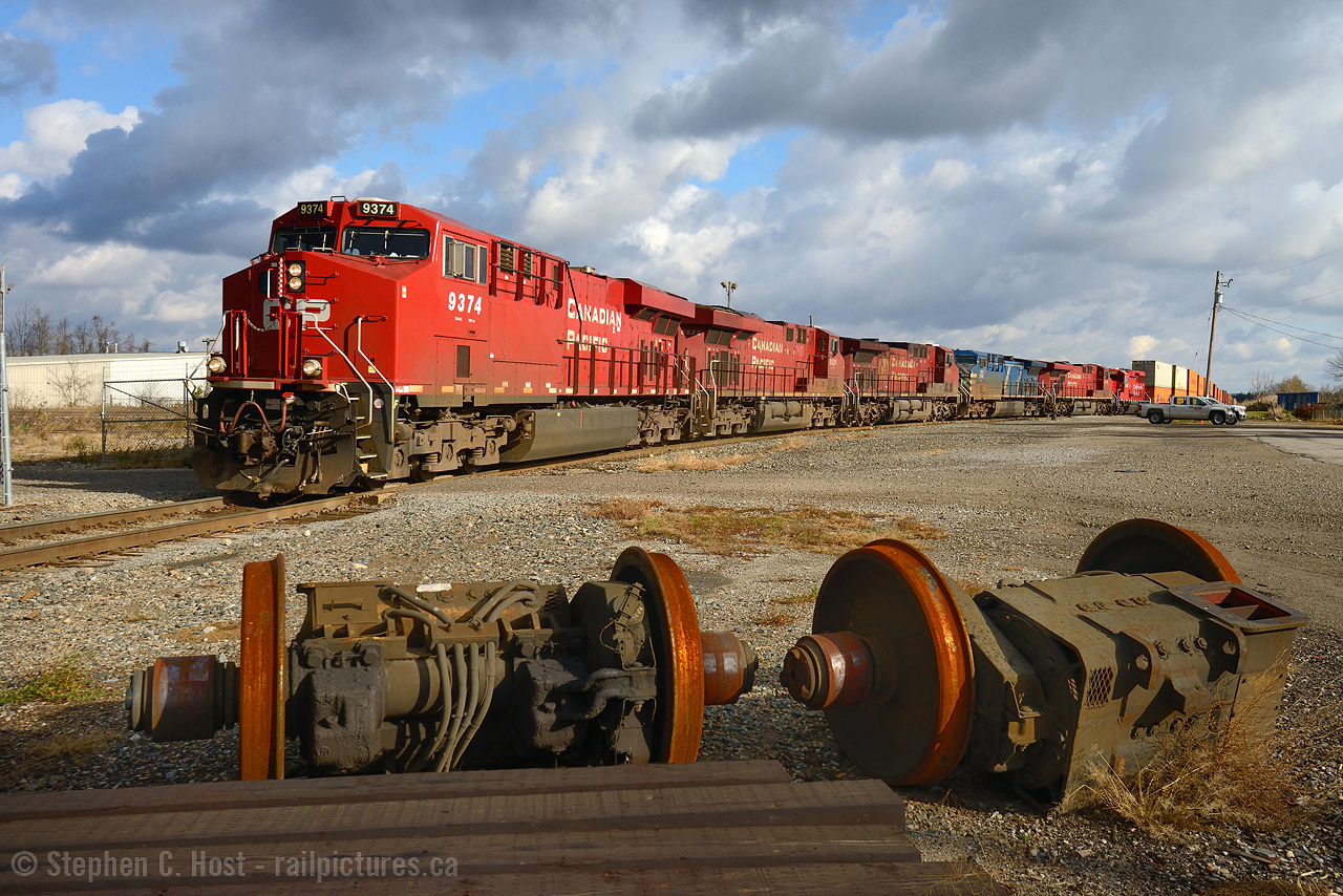 Engines.. with wheels passing wheels from a London Yard locomotive, the Pickup having derailed in the GJR yard in the summer requiring a wheel changeout to a locomotive (Anyone notice which one?). Months later this pair made an interesting prop while a suckerhole gifted me with sunshine for a brief 30 second window of time. Lucky I guess!