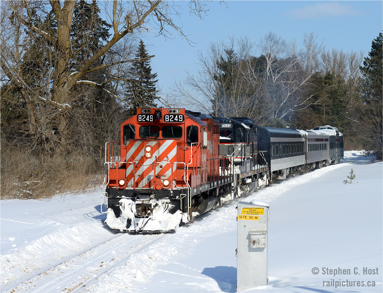 Having departed Orangeville, the Orangeville-Brampton Railway's Credit Valley Express snow train accelerates to track speed with the last CP GP9 to survive on the CP roster, 8249 in the charge.