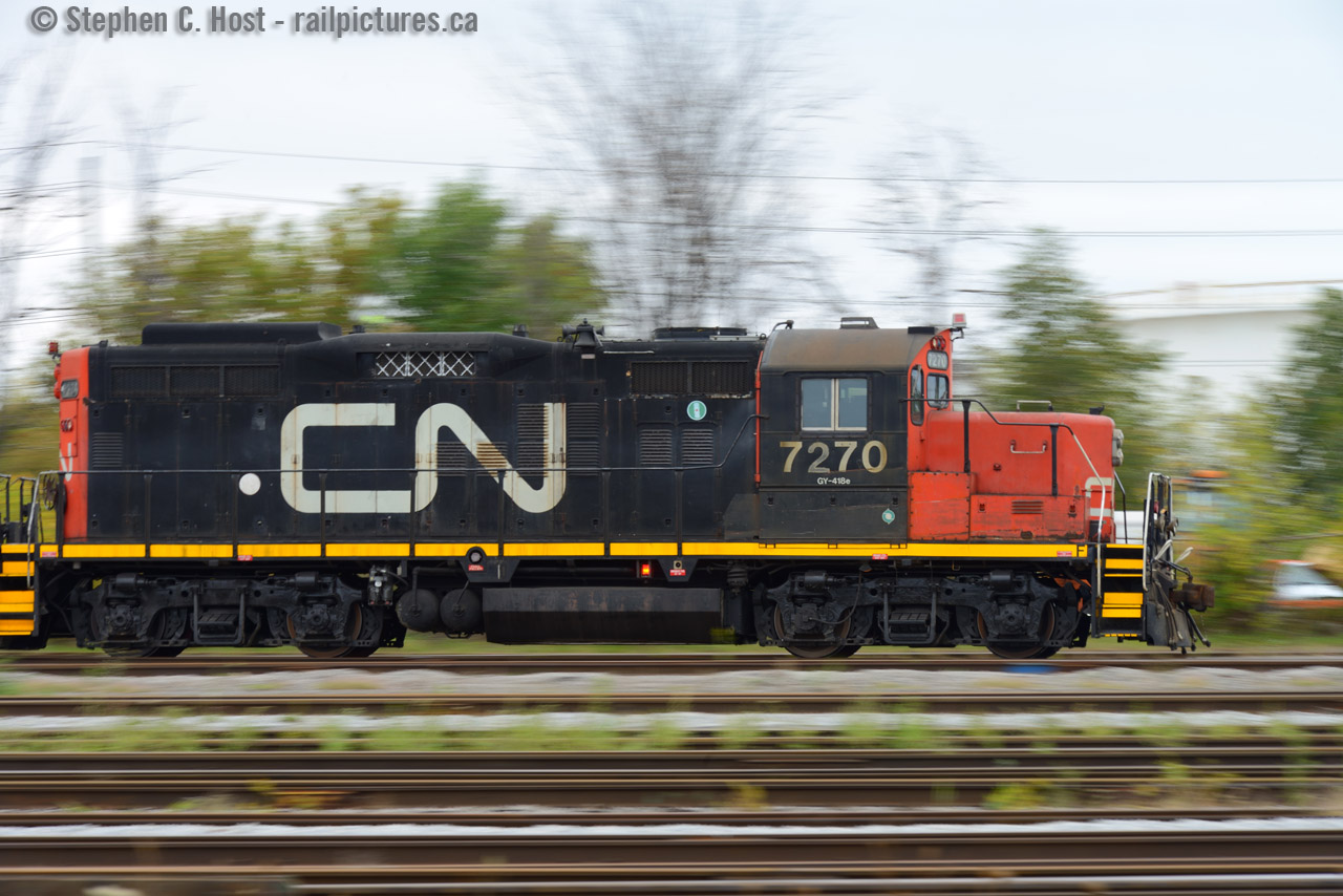 The CN GP9 at speed, working Sarnia Yard, day in and out in relative obscurity. For a brief moment, a camera focuses on the subject, exposes an image, and back to the mundane toiling go the crew and their engine. It may not be glamorous work, but lets not forget the people who do this job, 24 hours a day, 7 days a week, many of whom browse this site. It may not have the romance of the mainline, but it is a job that has to be done and it pays the bills. So too should the camera focus on the mundane, so one day it may be appreciated, lest it only become a memory.