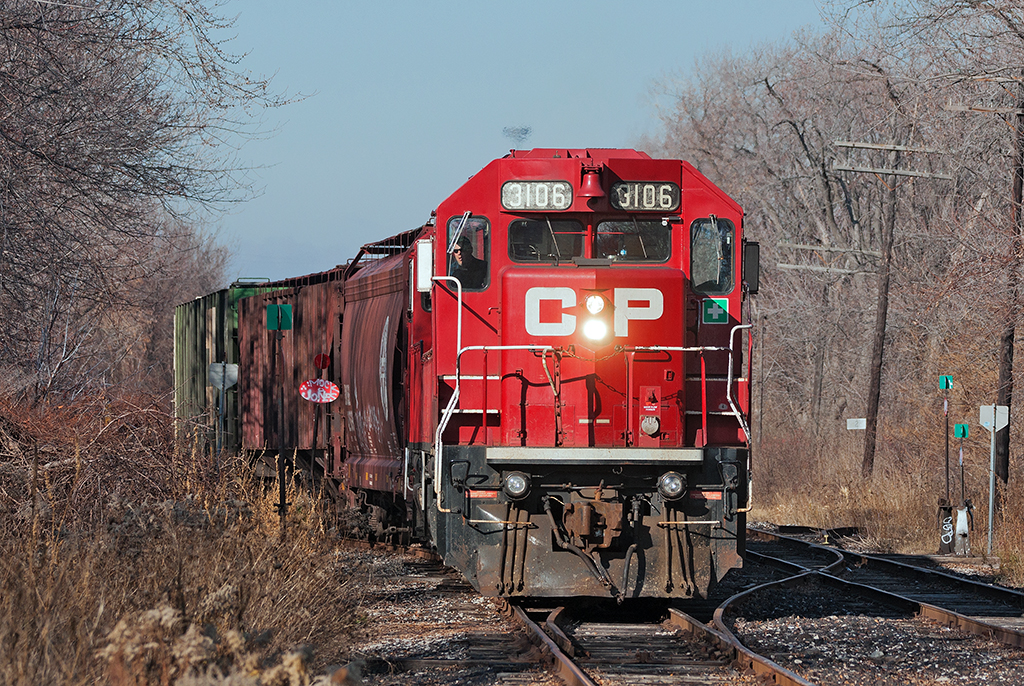An extra yard assignment out of Agincourt shoves 9 loaded clay cars into the runaround before heading to the other end to switch out Versapet on the Canpa Sub.