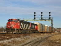 Oshawa to Chicago train 271 rolls under the classic signal bridge at Paris Junction with CN 5548 and CN 5351 providing the power.
