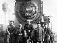 Sitting on the diamond, the crew of CPR extra north 886 have been requested to pose for a photograph.A tradition in the steam era.  From left to right, Engineer Jim Hardy, Firemen Doug Lupson, the Conductor unfortunately who,s name is missing from memory, then brakemen Bill Pegg and Vern Nicholson. Submitted with permission and help from the firemen Doug Lupson. 