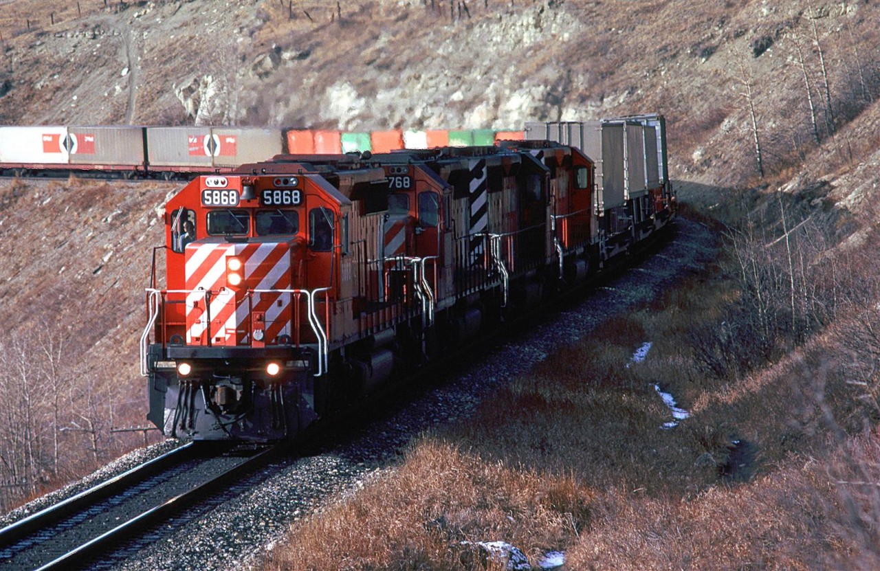 Westbound, east of Cochrane along the Bow River. Remember when COFC and TOFC were king?