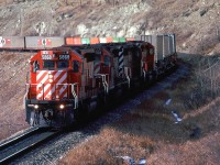 Westbound, east of Cochrane along the Bow River. Remember when COFC and TOFC were king?