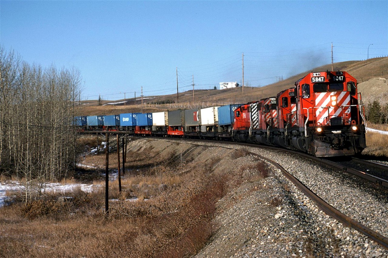 Eastbound intermodal about to cross the Bow River in west Calgary.