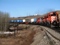 Eastbound intermodal about to cross the Bow River in west Calgary.