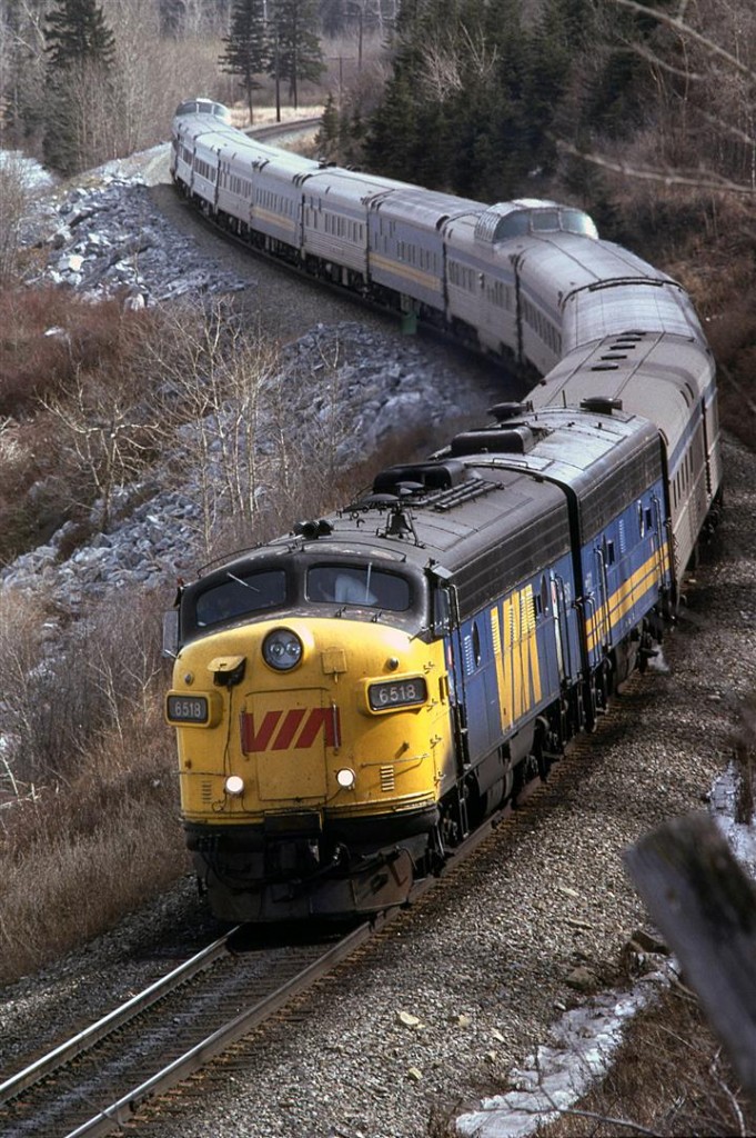 About 20 minutes after the eastbound "Canadian" passed, its westbound counterpart arrived at the east switch at Brickburn. The lead unit was sporting the red "VIA", a relative rare site. Don't you love the jerry-rigged ditch light setup.