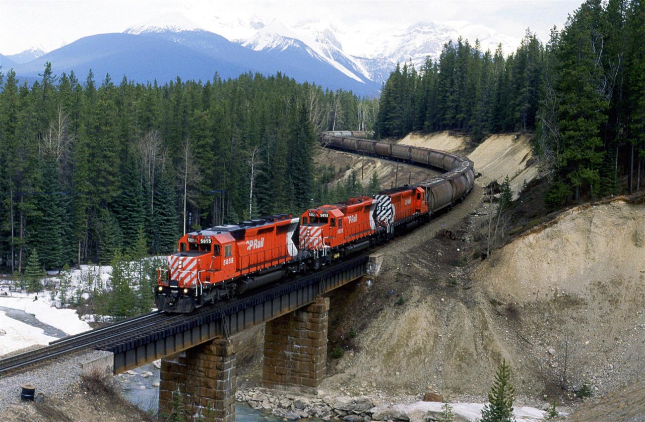 The westbound potash train glides by the much-photographed curve just east of Ottertail siding.
In more recent pictures, I see that an ugly new pole line was installed adjacent to the tracks.