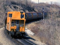 CP's cabooses were like their motive power- all the same, but attractive nonetheless. This one is on the tail of a westbound grain train in west Calgary