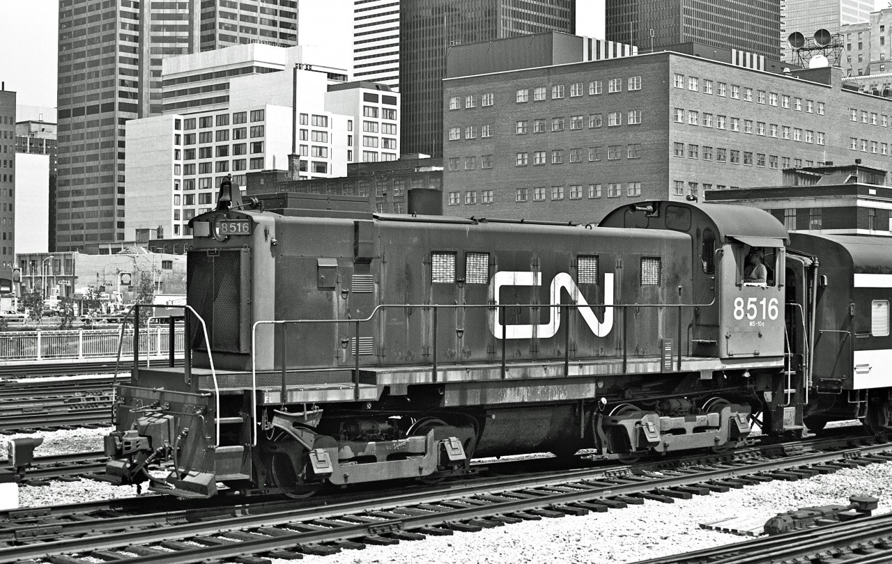 Built in July '58, MLW S13u #8516 approaches Union Station.  Circa 1975.