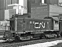 Built in July '58, MLW S13u #8516 approaches Union Station.  Circa 1975.