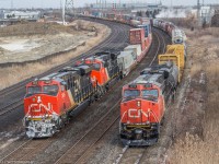 The Hopkins St overpass in Whitby rarely disappoints! 

CN M373 is seen working at the Oshawa yard on the South Service track, while a late running CN Q121 comes by on the North track. 


It's interesting to see the three generations of GEVOs CN has purchased over the years.

M373 - CN 2252 & DPU CN 8937

Q121 - CN 2836 & CN 3030