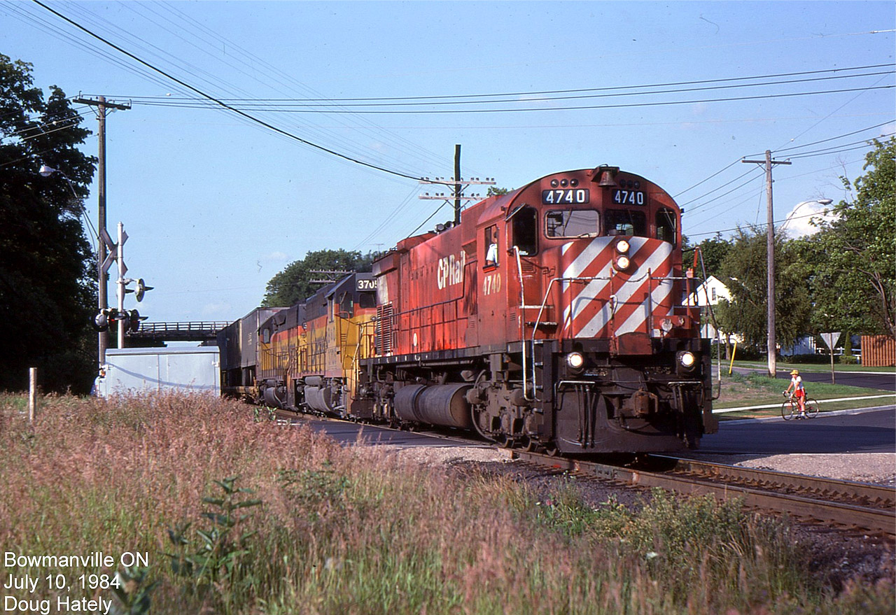 C630 4740 leads two B&O leasers with 903's train on a warm July 10/84