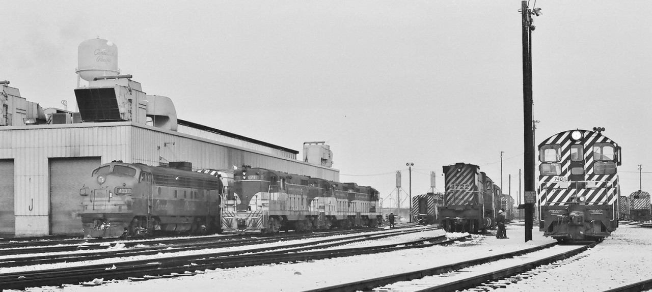 Time is everything....


…and why waste a precious (film ) frame – on a gray dreary drab January Sunday afternoon?


January 1978 Kodak  Negative transported in a Nikkormat EL by S.Danko


More 1970's  Agincourt
 

          CPR 4037  
 

  CP Rail 4035  
 

  December 1978  
 

  ..uh oh..  
 


What's interesting: 
 

in this b & w shot perhaps eight different locomotive models ( where can you capture that today?) 
 

left to right 
 

GMD FP7a ( CPR 4037 ) 
 

MLW C-424 ( coupled to 4037) 
 

three GMD GP7, TH&B 71 - 74 - 75, somewhat unusual as the norm for the TH&B Kinnear / Starlight would be a GP7 – GP9 – GP7 lashup ( 7x - 40x - 7x ) 
 

GMD FP7 or FP9 
 

two MLW M636 ( CP Rail 4722 - 47xx ) 
 

MLW RS-23 
 

GMD SW9 ( CP Rail 7400 ) 
 

MLW (M636 or C-424)? 
 

..glad I did use that ( film ) frame …. not wasted after all....and time is everything.... 
 

sdfourty