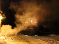 Vehicle's outside temperature gauge shows a bone chilling -29 Celsius as 9676 waits at the station during a crew change.