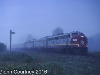 The early morning fog has not burned off yet as Algoma Central's Agawa Canyon Tour Train rolls through Heyden, 14 miles north of Sault Ste. Marie.