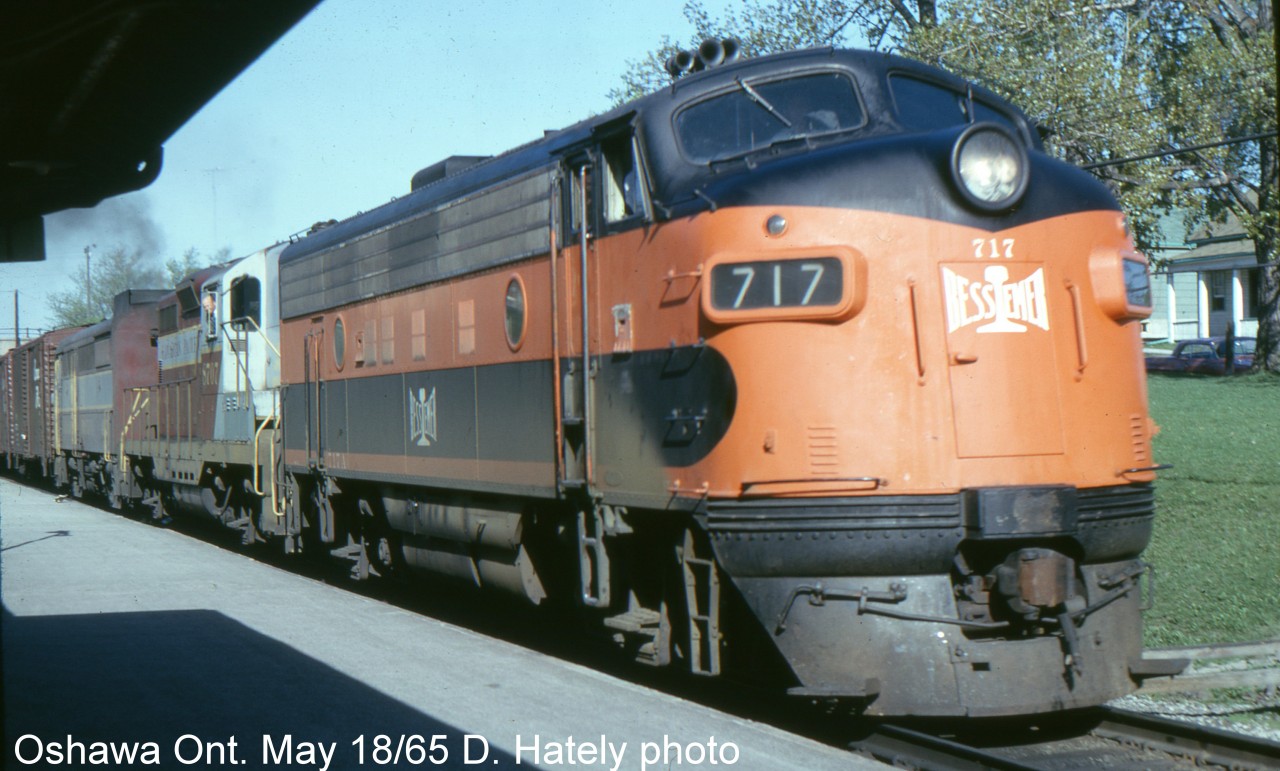 CP train 903 is passing Oshawa depot with leased B&LE 717, GP-9 8707 and an FA-1.