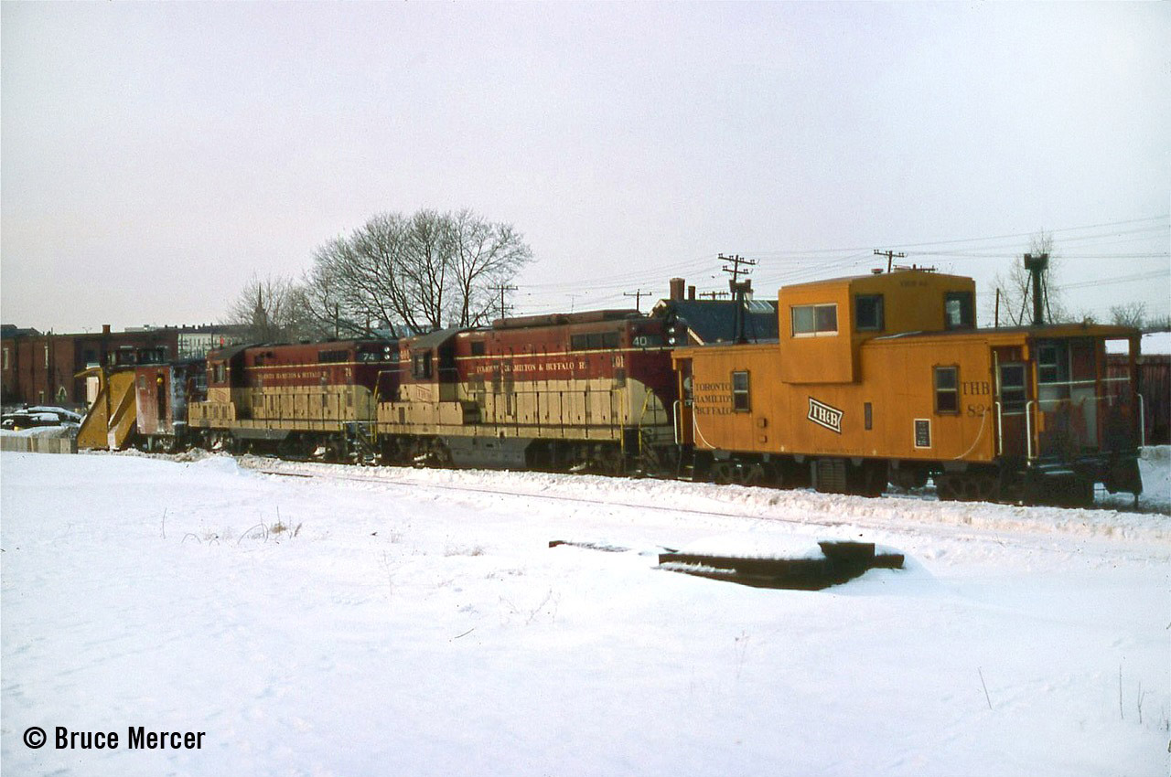 Plow Extra 74 with 401 and (CP) Angus-built caboose westbound through Brantford at Newport Street yard.